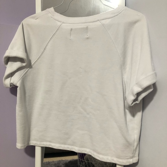 Calvin Klein white logo crop top. size large, relaxed look and feel. NEVER WORN - Picture 2 of 4